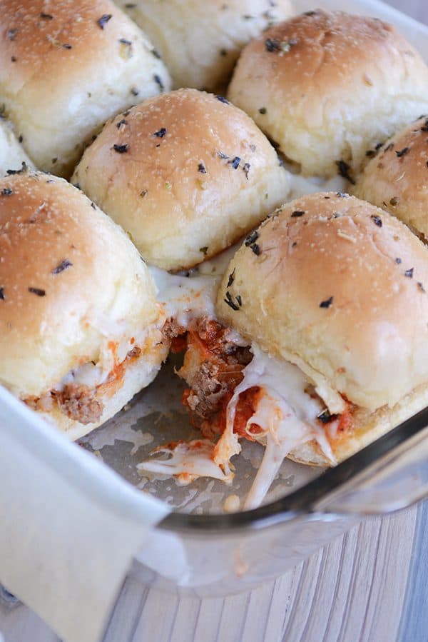 A tray of cheesy pepperoni pull-apart pizza sliders.