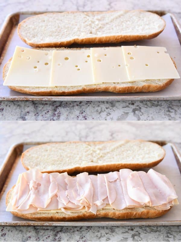 Layering meat and cheese on sheet pan panini.