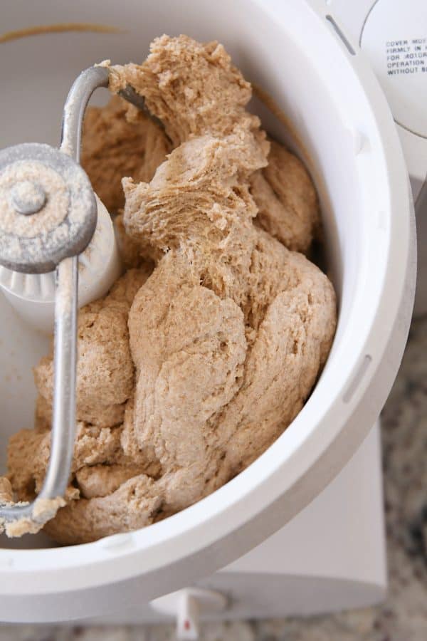 Whole wheat bread dough mixing in a Bosch.