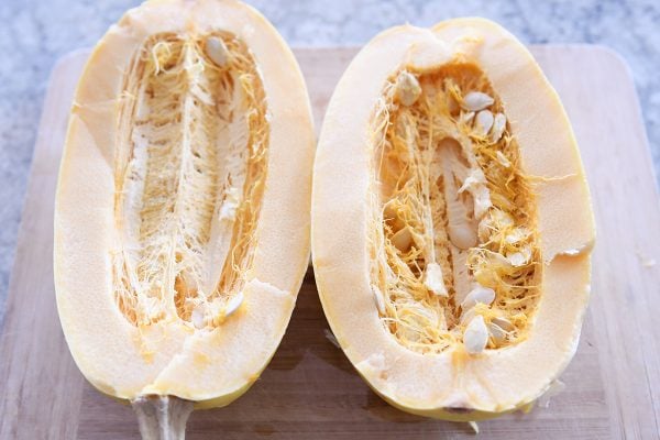 Cut spaghetti squash with seeds.